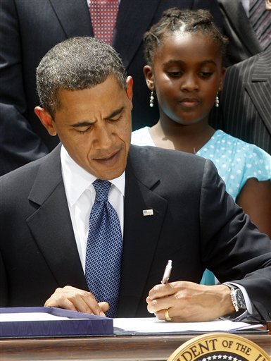 Obama signs the bill